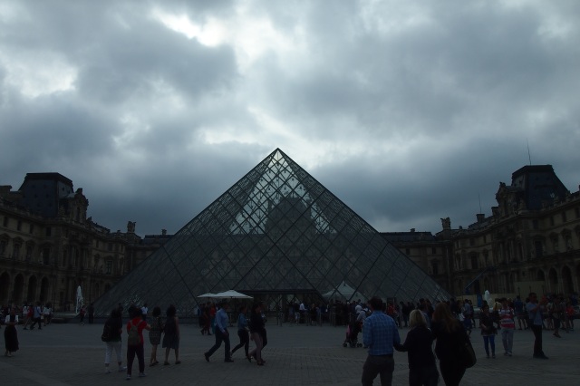 Grey skies greeted us but nothing can dull the beauty of the Louvre.